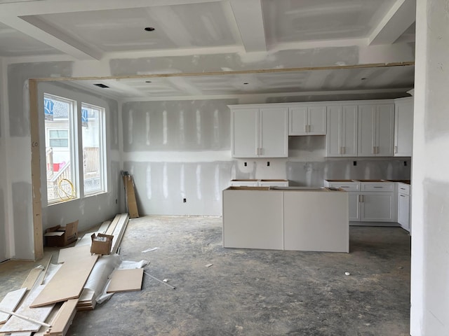 kitchen featuring white cabinetry