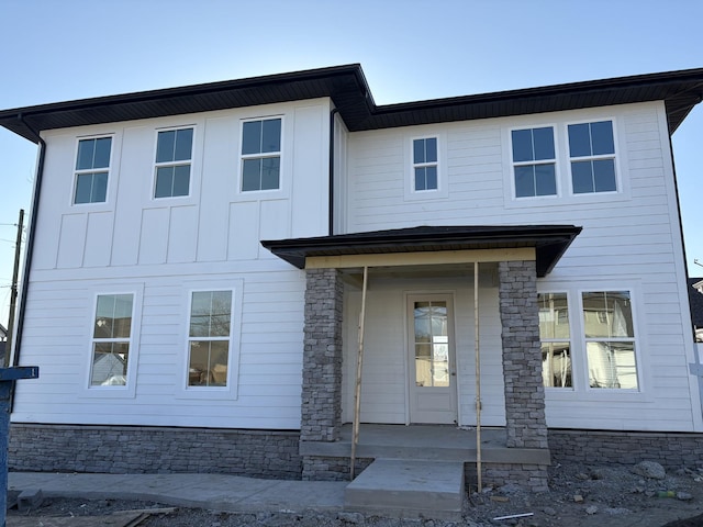 view of front of property with covered porch and board and batten siding