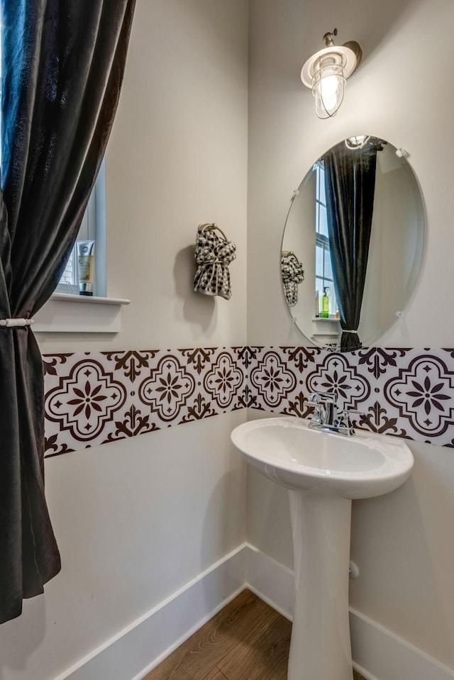 bathroom featuring wood finished floors