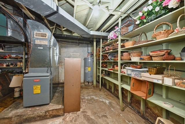 storage area with electric water heater