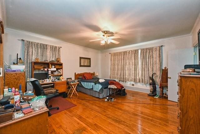 bedroom with wood finished floors