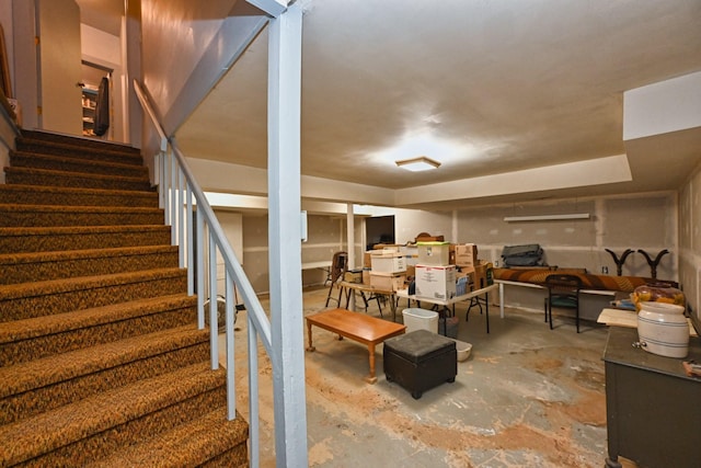 finished basement featuring stairway