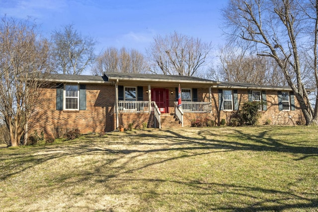 ranch-style house featuring a front yard, covered porch, and brick siding