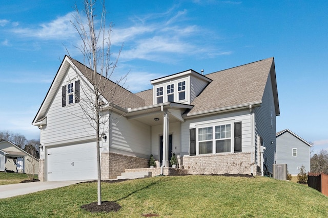 view of front facade featuring a garage, brick siding, and a front lawn