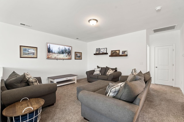 living room with carpet floors and visible vents