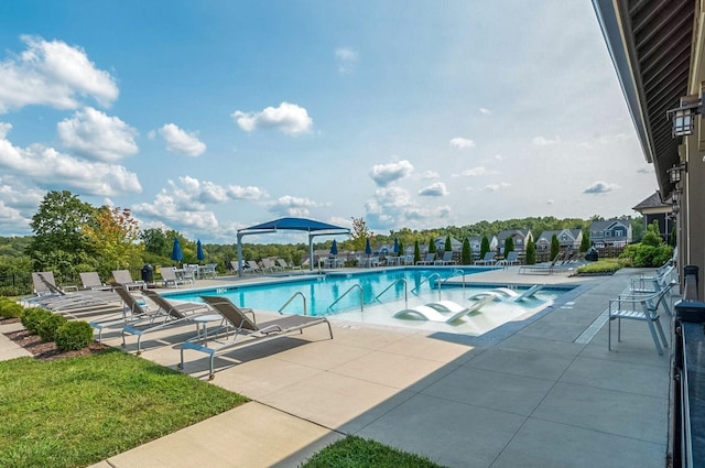 pool with a patio area