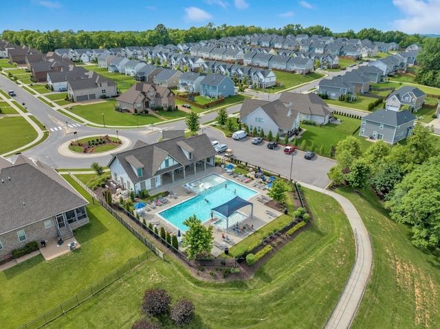 birds eye view of property with a residential view