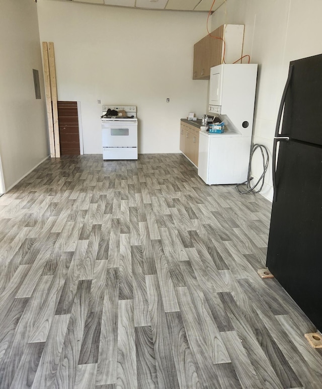 kitchen featuring white appliances and light wood-style flooring