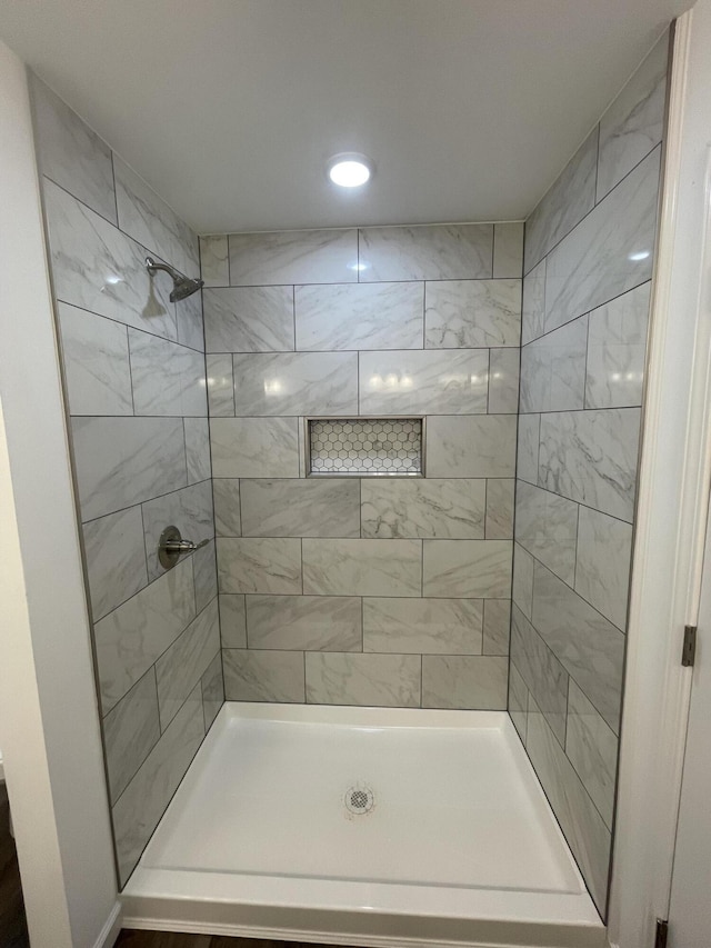 bathroom featuring a stall shower