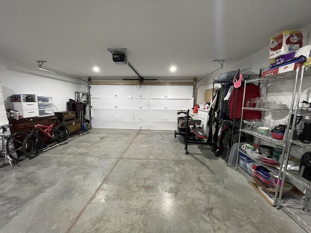 garage featuring a garage door opener