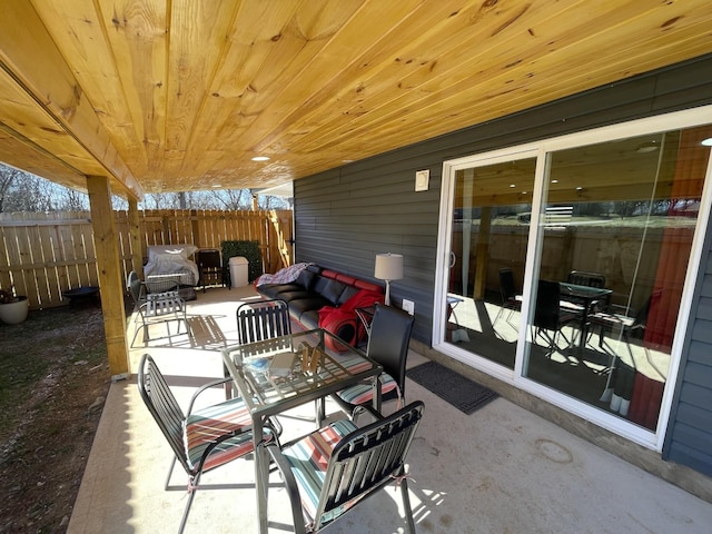 view of patio with fence