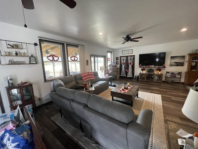 living room with recessed lighting, dark wood finished floors, and ceiling fan