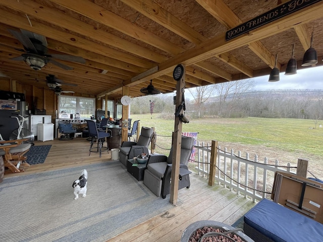 deck with ceiling fan and outdoor dining space