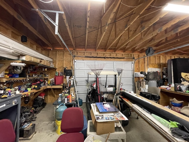 garage with a workshop area