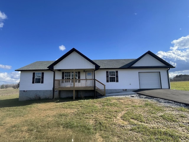 ranch-style house with a garage, aphalt driveway, crawl space, covered porch, and a front yard