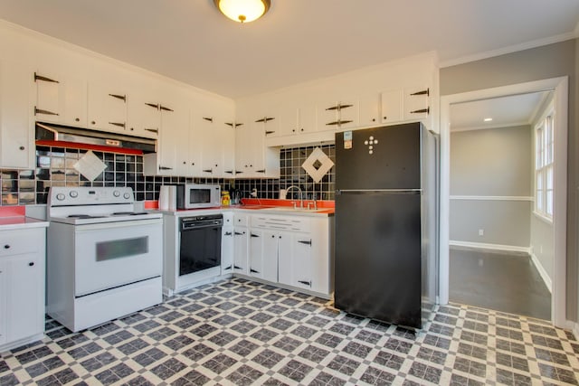 kitchen with crown molding, light countertops, backsplash, white cabinets, and black appliances