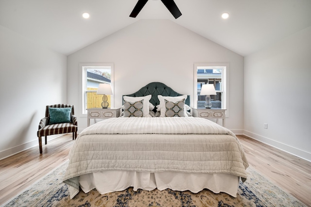 bedroom featuring recessed lighting, vaulted ceiling, ceiling fan, light wood-type flooring, and baseboards