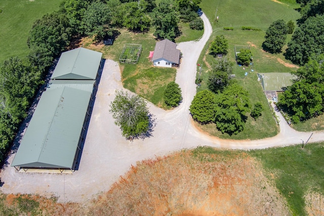 birds eye view of property with a rural view