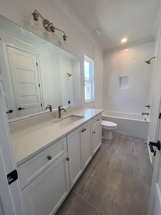 bathroom with visible vents, vanity, toilet, and shower / bathtub combination