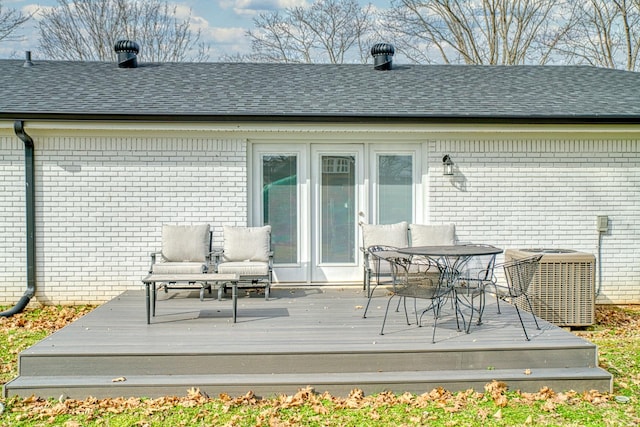 23 Hickman Hwy, Gordonsville, TN 38563 - back of house featuring a shingled roof, outdoor dining area, central AC, and a wooden deck