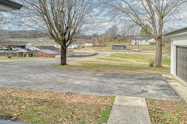 23 Hickman Hwy, Gordonsville, TN 38563 - view of yard featuring a garage and a residential view