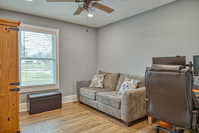 23 Hickman Hwy, Gordonsville, TN 38563 - home office featuring a healthy amount of sunlight, light wood finished floors, ceiling fan, and baseboards