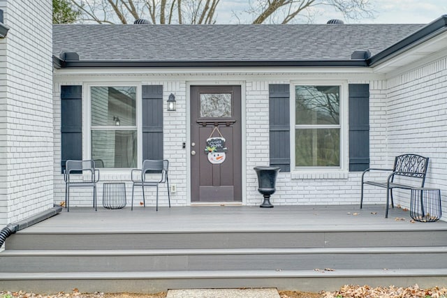 23 Hickman Hwy, Gordonsville, TN 38563 - property entrance with a porch, brick siding, and roof with shingles