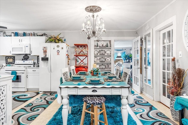 dining space with a chandelier and ornamental molding