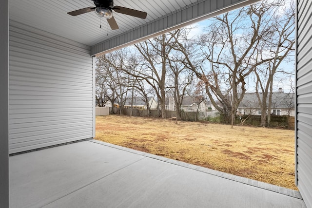 view of patio with a fenced backyard and ceiling fan