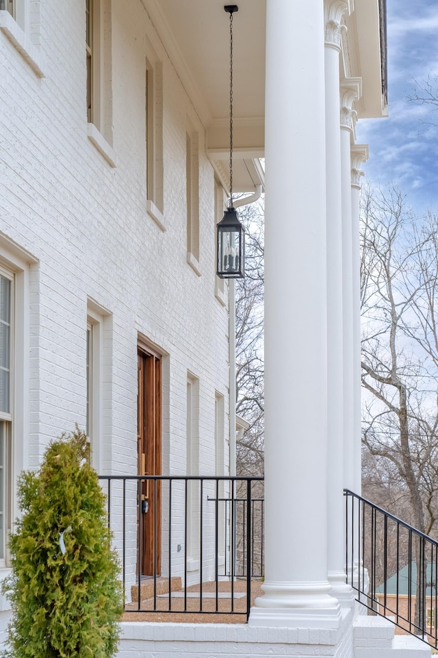 exterior space featuring brick siding