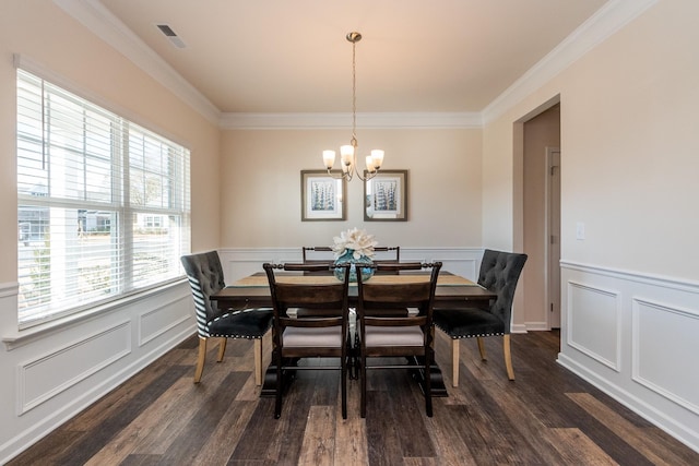 dining space featuring an inviting chandelier, visible vents, dark wood-style floors, and crown molding