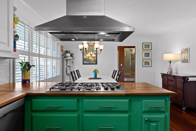 kitchen with island range hood, stainless steel gas cooktop, ornamental molding, dishwasher, and green cabinetry