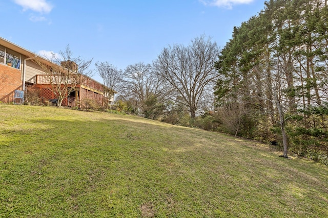 view of yard with a deck