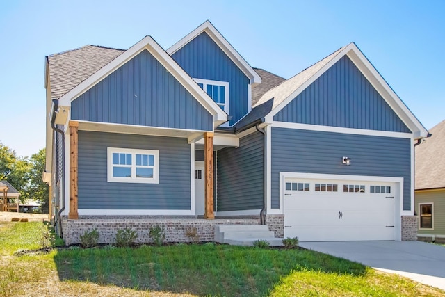 craftsman-style home with a garage, brick siding, concrete driveway, roof with shingles, and board and batten siding