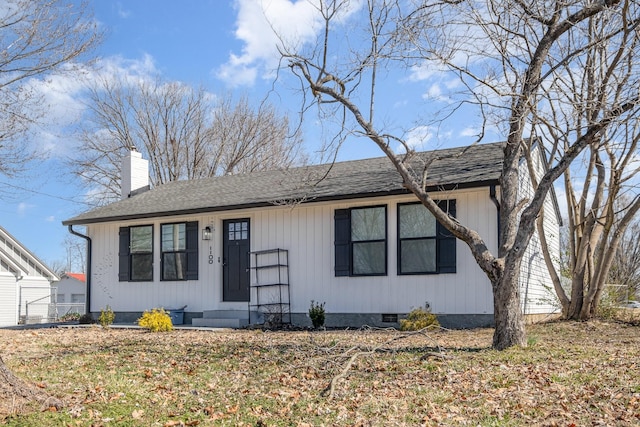 1100 S Russell St, Portland, TN 37148 - view of front of home featuring a chimney, a shingled roof, crawl space, and entry steps