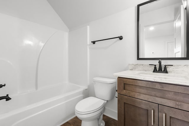 full bathroom with shower / bath combination, baseboards, toilet, vaulted ceiling, and vanity