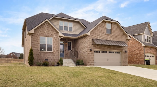 craftsman house with a garage, a front yard, concrete driveway, and brick siding