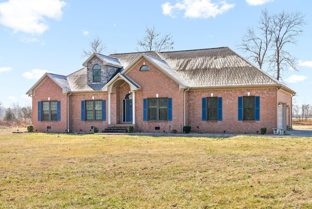 traditional home with a garage, brick siding, and a front lawn