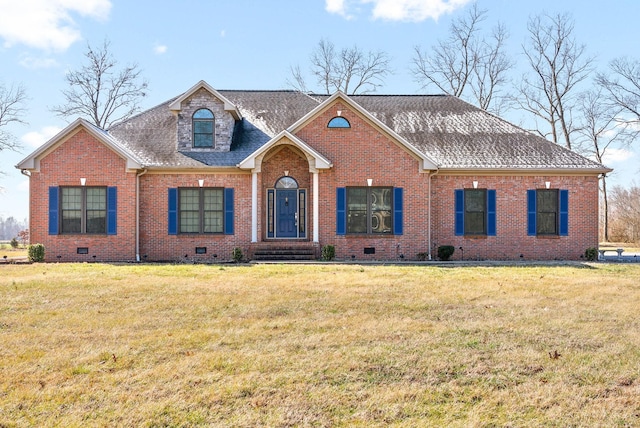 view of front of house featuring crawl space, roof with shingles, a front lawn, and brick siding