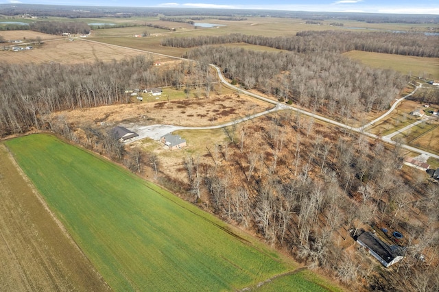 birds eye view of property featuring a rural view