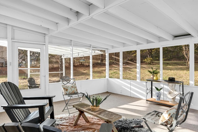 sunroom with beamed ceiling