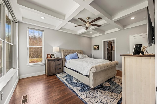 bedroom with dark wood-style floors, coffered ceiling, and baseboards