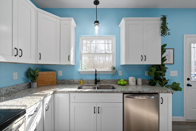 kitchen featuring dishwasher, light stone counters, decorative light fixtures, white cabinetry, and a sink