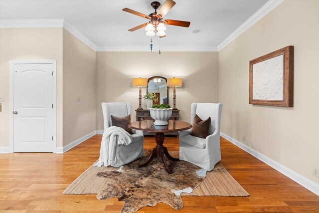 505 Wilcox St, Clarksville, TN 37040 - dining area with ornamental molding, light wood-type flooring, ceiling fan, and baseboards