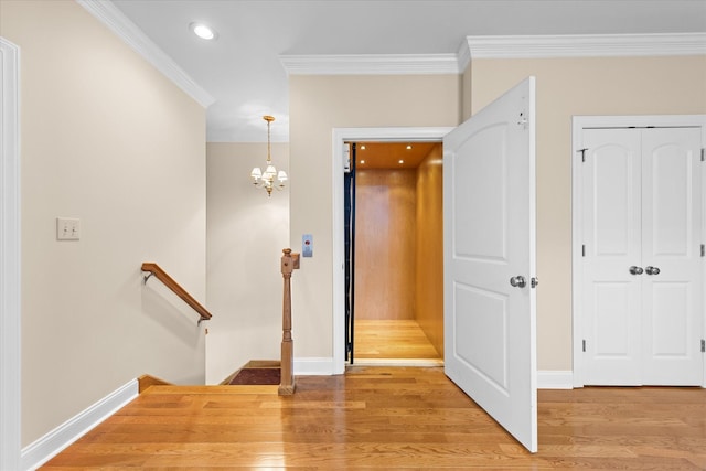 505 Wilcox St, Clarksville, TN 37040 - entryway featuring baseboards, wood finished floors, an inviting chandelier, crown molding, and recessed lighting