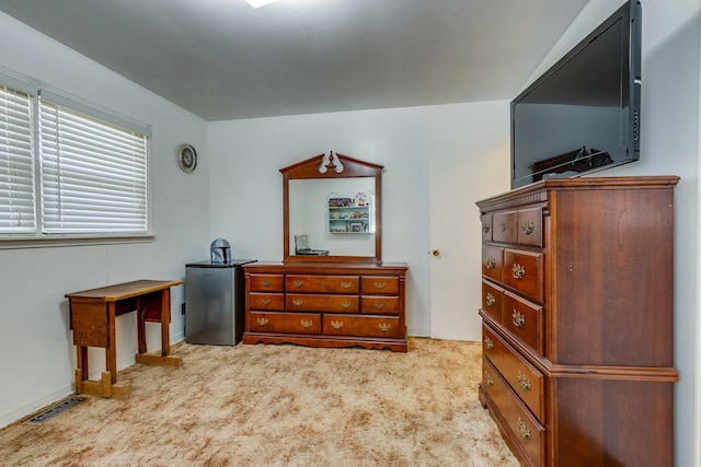 carpeted bedroom with visible vents