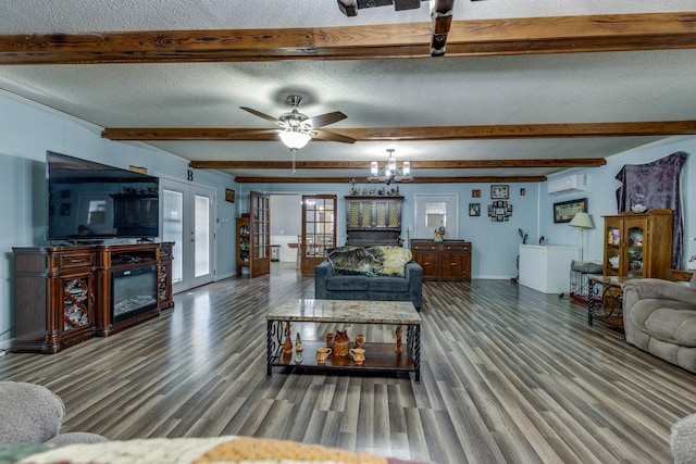 living room featuring ceiling fan, beamed ceiling, wood finished floors, a textured ceiling, and french doors