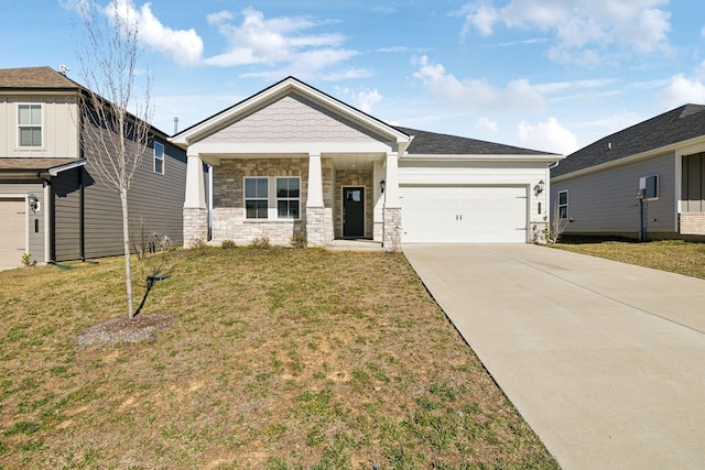 view of front of home featuring a garage, stone siding, concrete driveway, and a front yard