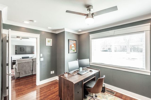 office area with baseboards, crown molding, ceiling fan, and dark wood-style flooring