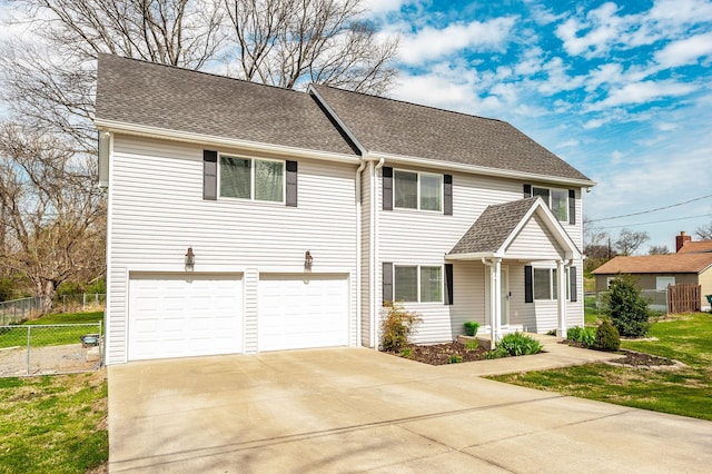view of front of house featuring roof with shingles, driveway, fence, and an attached garage